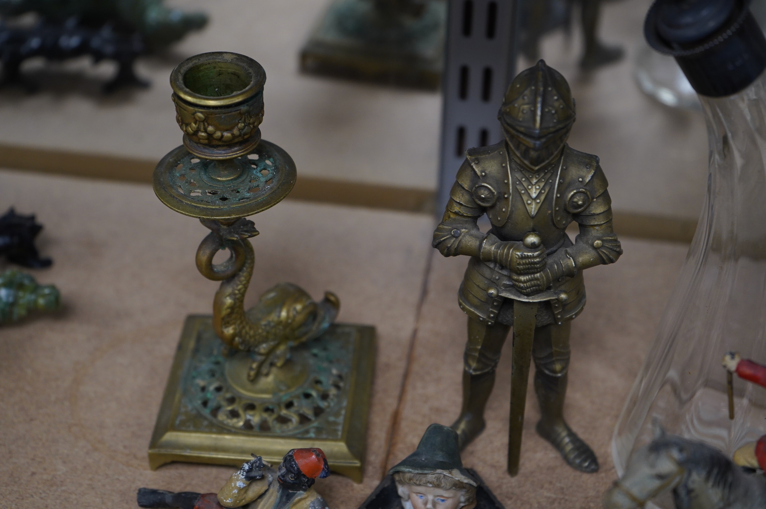 A group of spelter and other metalware items including a table lighter, inkwell etc (8). Condition - varies